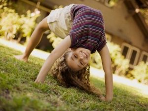 child doing a backbend